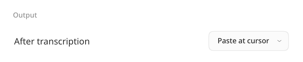 The Output group in Settings → Dictation, with After transcription set to Paste at cursor